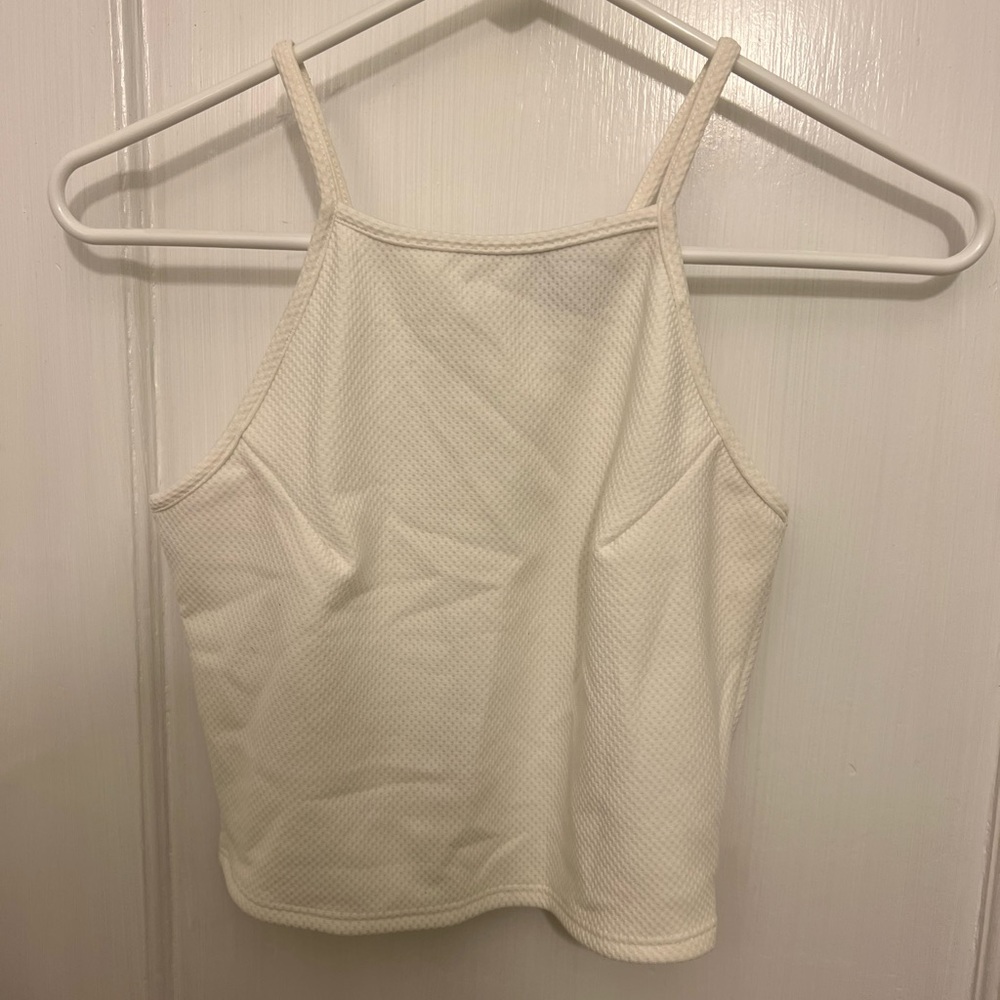 We steal white cropped tank